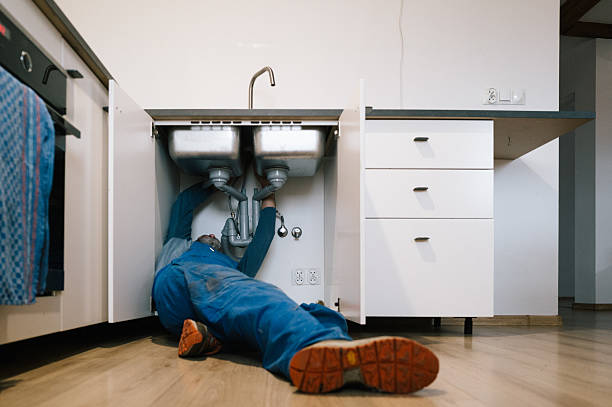 Professional Drain Cleaning technician working in Tuskegee, AL